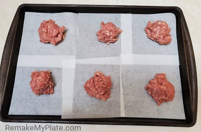 breakfast sausage mixture on waxed paper squares
