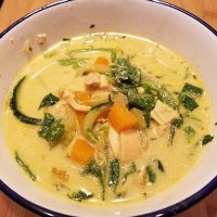 bowl of curry chicken zoodle soup