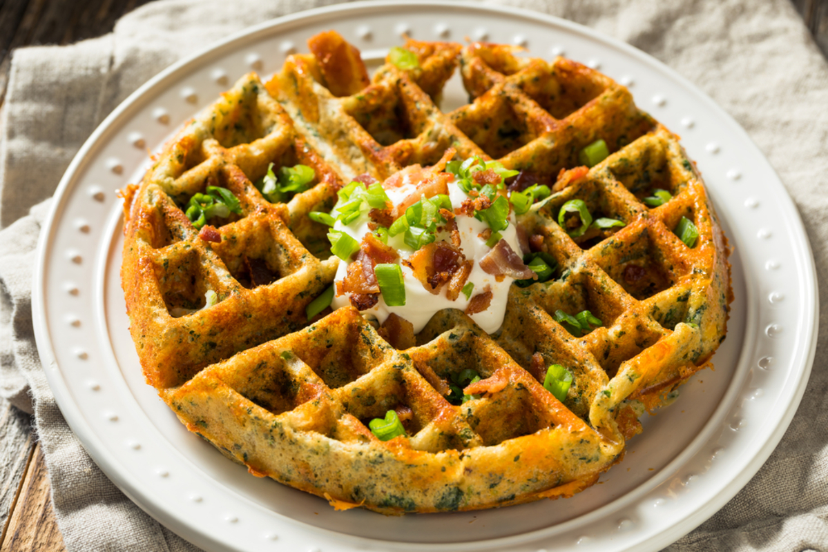 keto chaffle topped with bacon and green onions