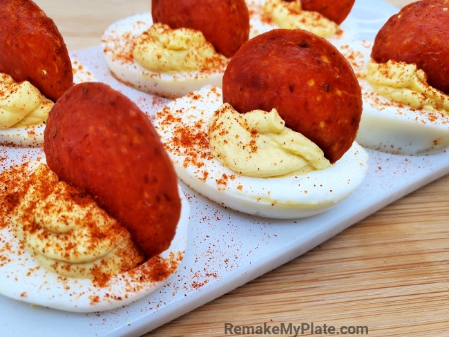 easy appetizer deviled eggs with cream cheese on a serving tray