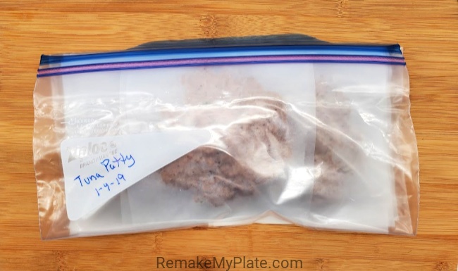 Remove the air from the freezer bag, seal and note the food/date on the bag.