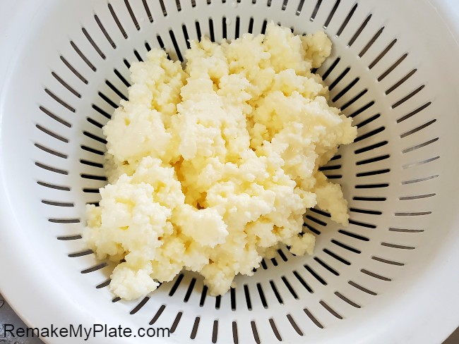 pour mixture into colander to separate butter from the buttermilk