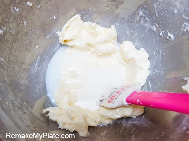 press the butter curds against the side of the mixing bowl to release the excess buttermilk