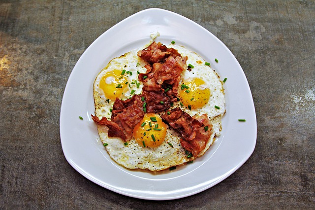 eggs and bacon on a plate