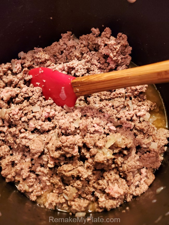 ground beef being browned in pan