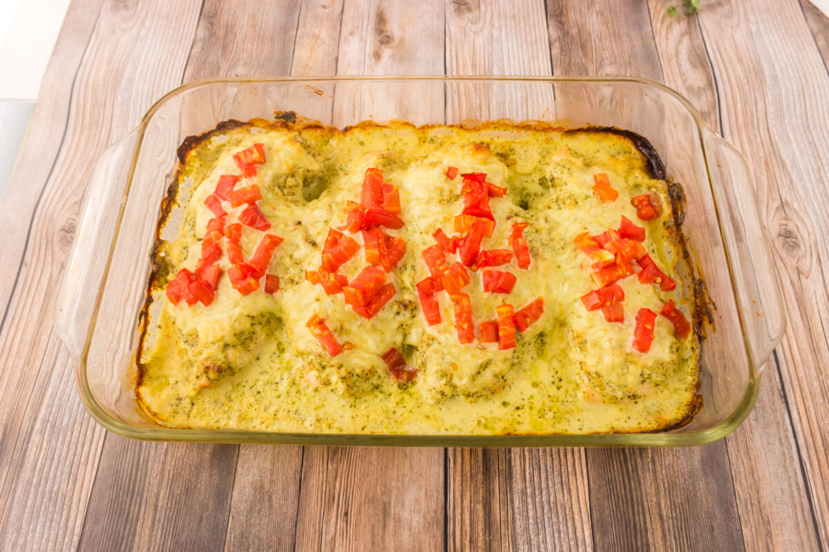 baked pesto chicken in a baking dish