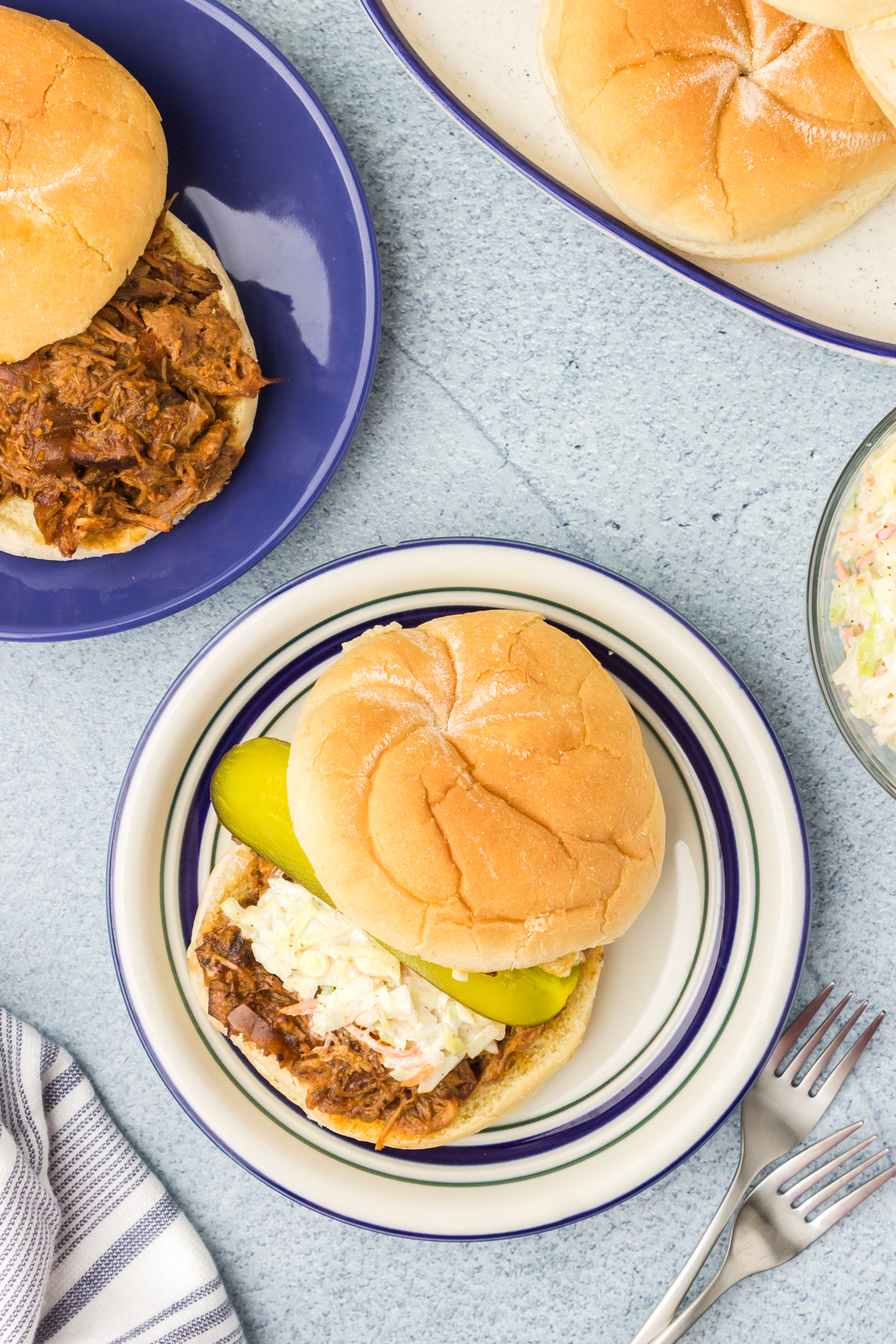 BBQ pulled pork sandwiches on plates