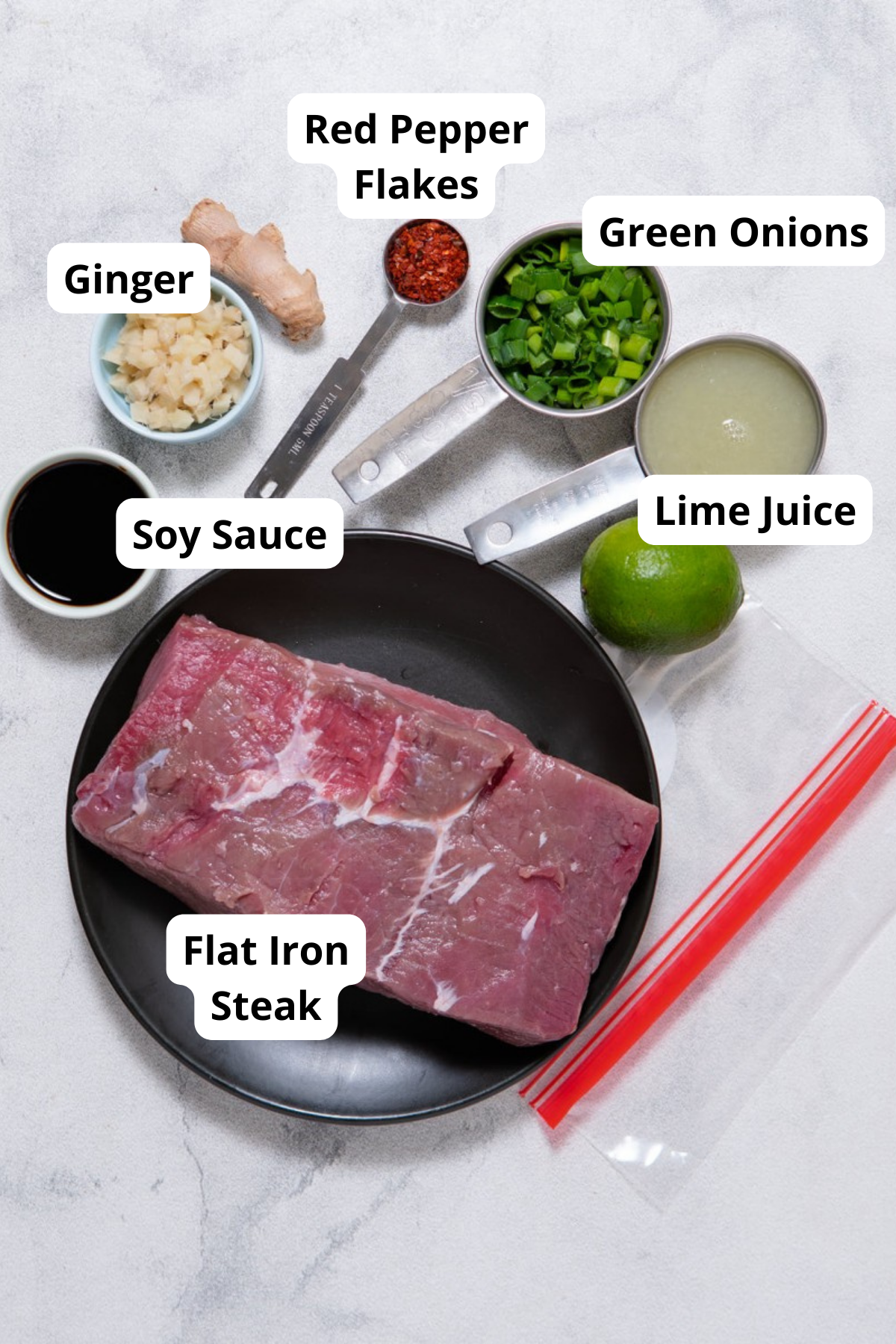 ingredients for marinated flat iron steak on table