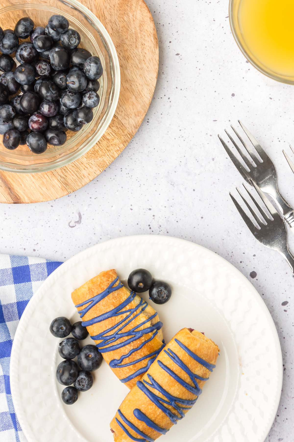 stuffed blueberry cream cheese crescent rolls on a plate