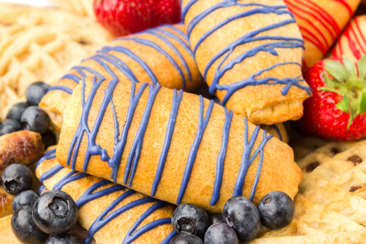 blueberry cream cheese crescent rolls on a breakfast board