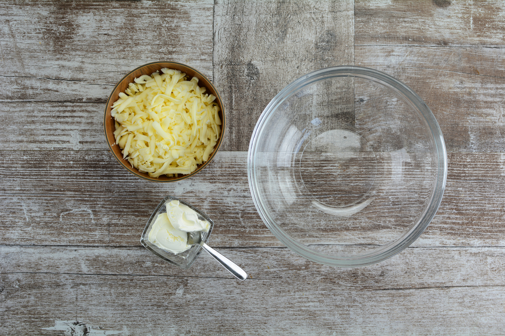 Add the shredded mozzarella cheese and cream cheese to a bowl to make fathead dough