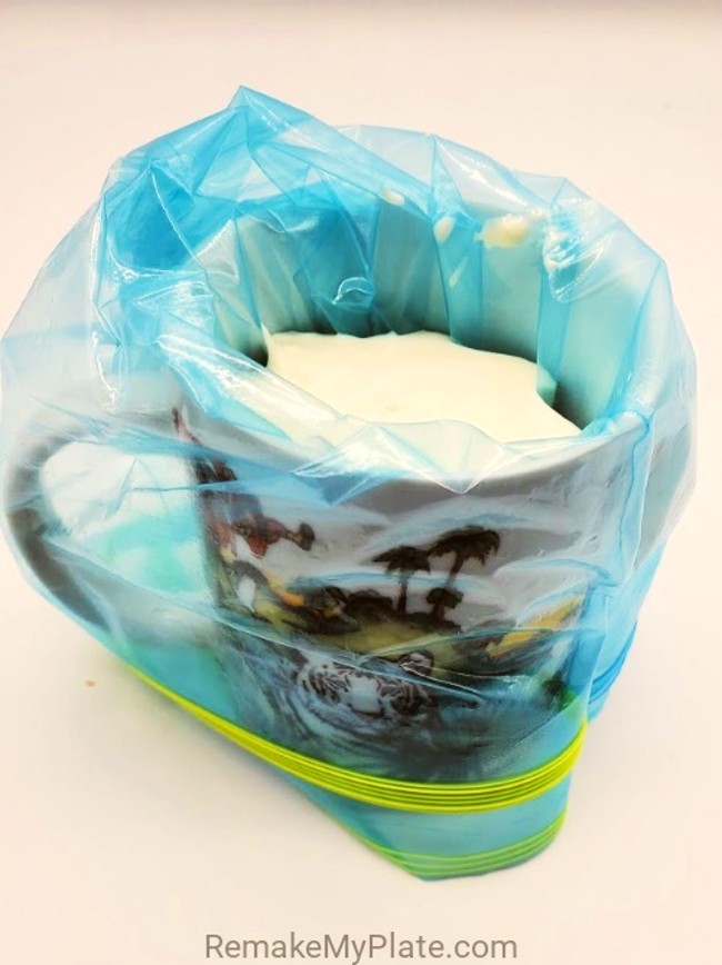 sandwich bag propped open with egg filling insdie