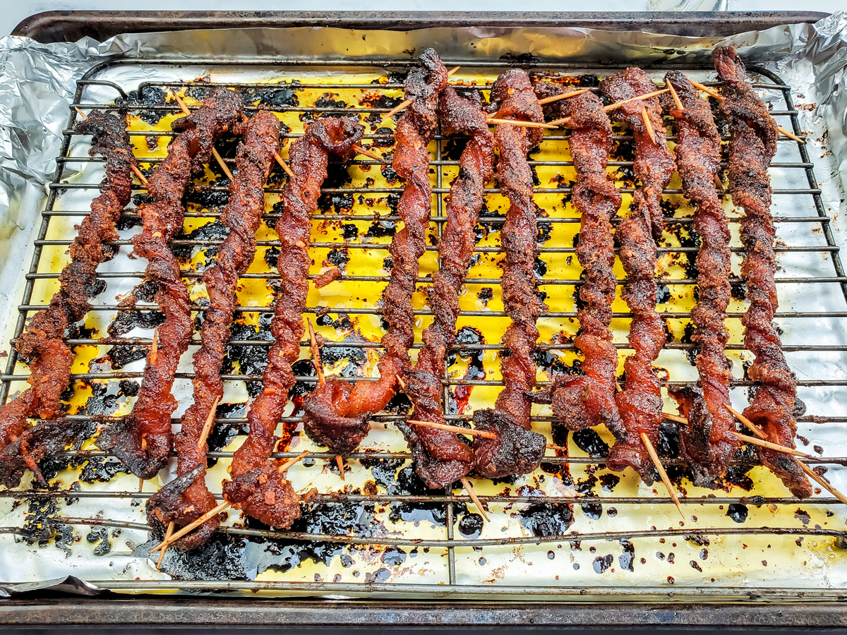 Twisted bacon cooked on a wire rack