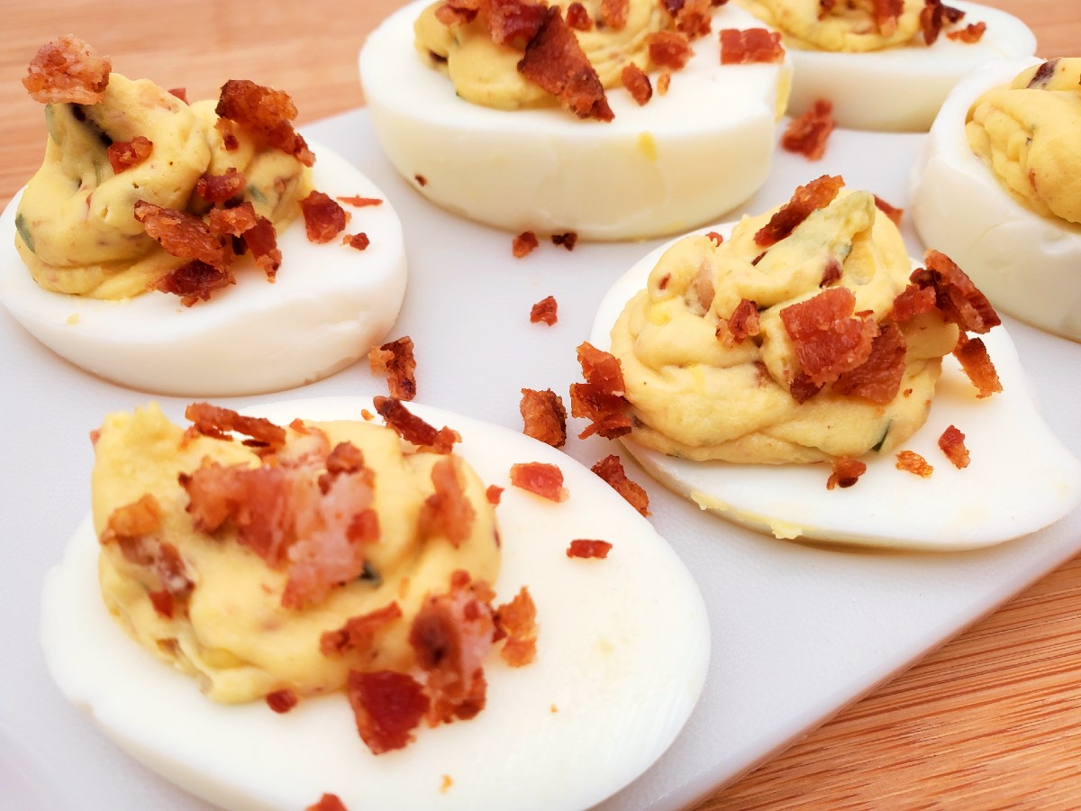 bacon ranch deviled eggs on a serving tray