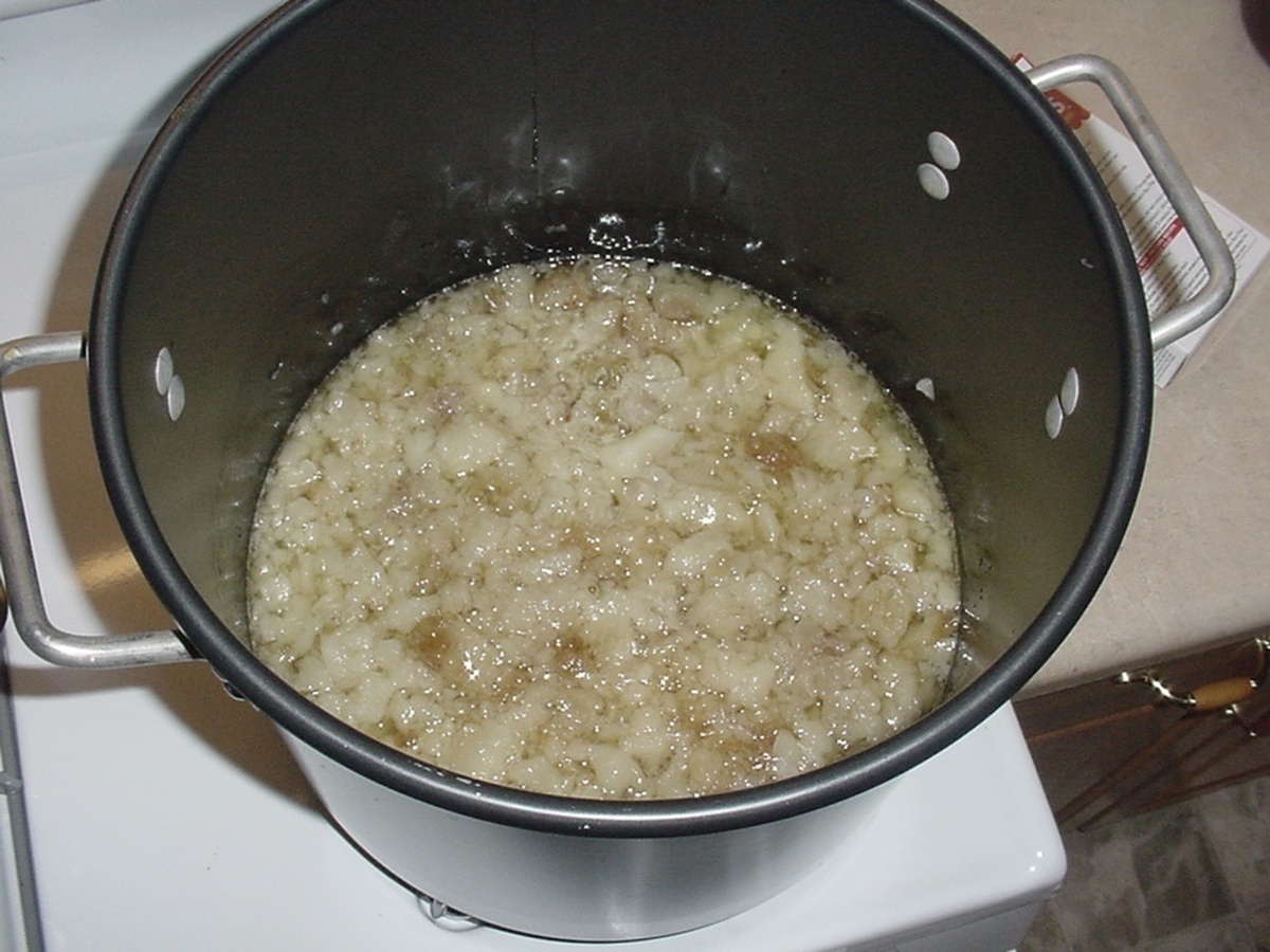 Beef fat in the pot pieces of beef suet starting to melt in a large stockpot