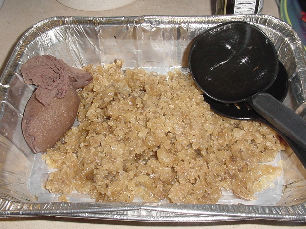 What remains when tallow is strained removing debris from melted beef tallow