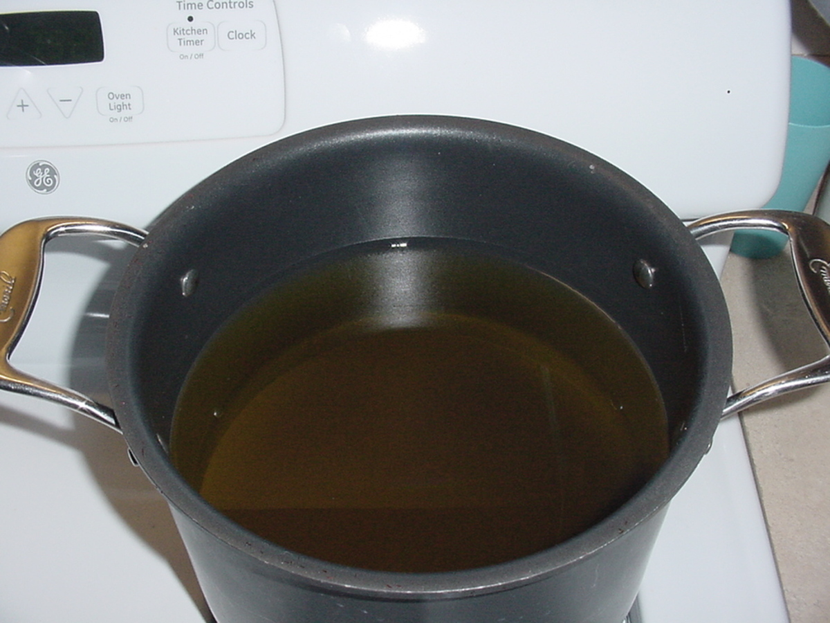 Melted beef tallow stockpot filled with melted rendered beef tallow
