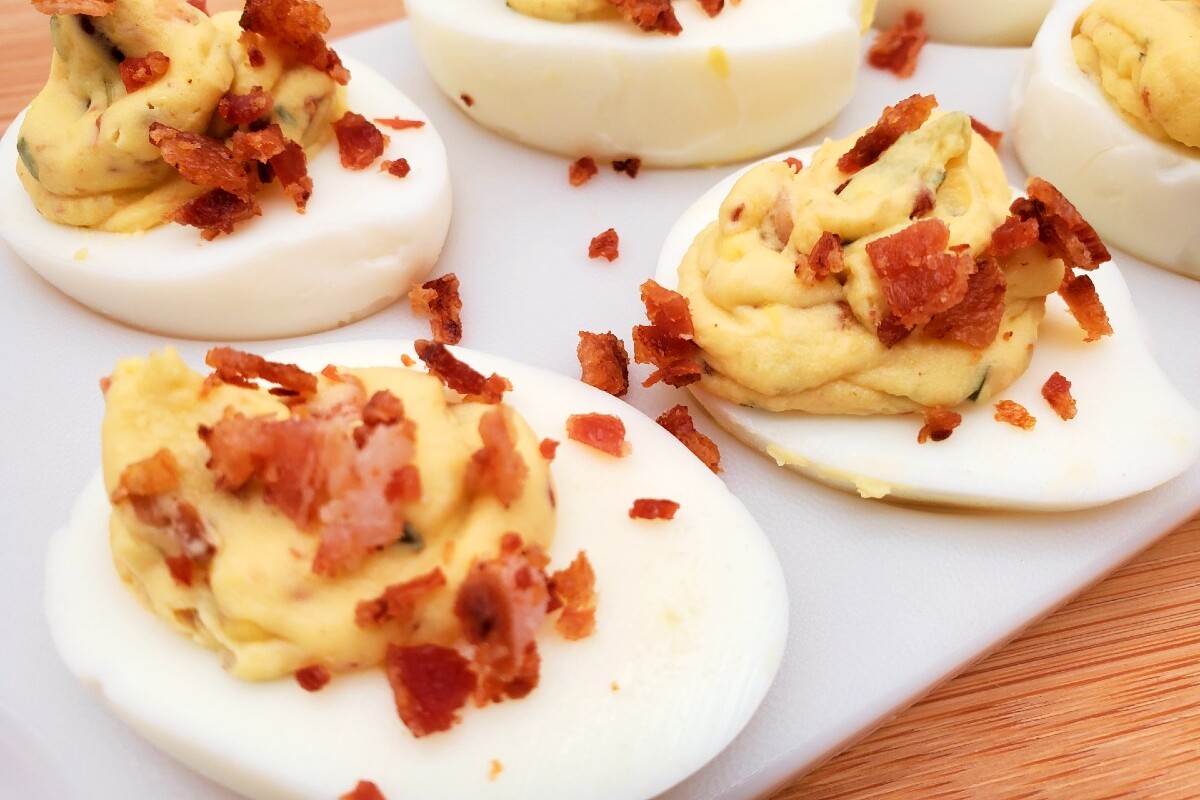 crack deviled eggs on a serving tray