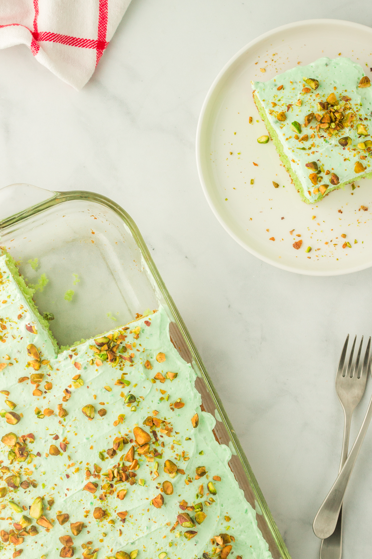 slice of pistachio cake made with a few simple ingredients