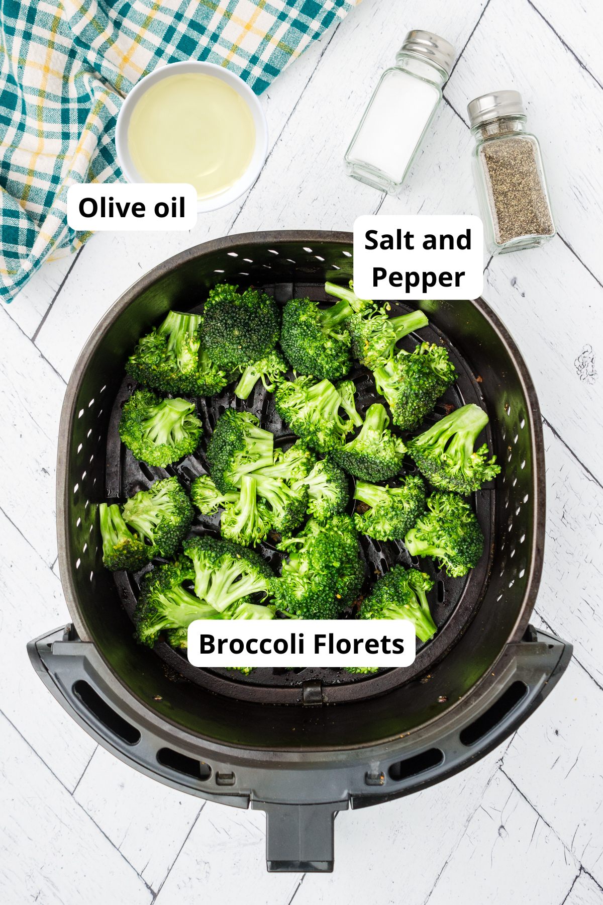 picture showing ingredients for this roasted broccoli recipe including broccoli, olive oil, salt and pepper
