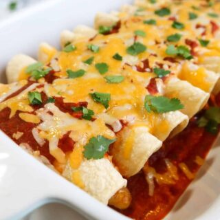 Shredded chicken tinga enchiladas