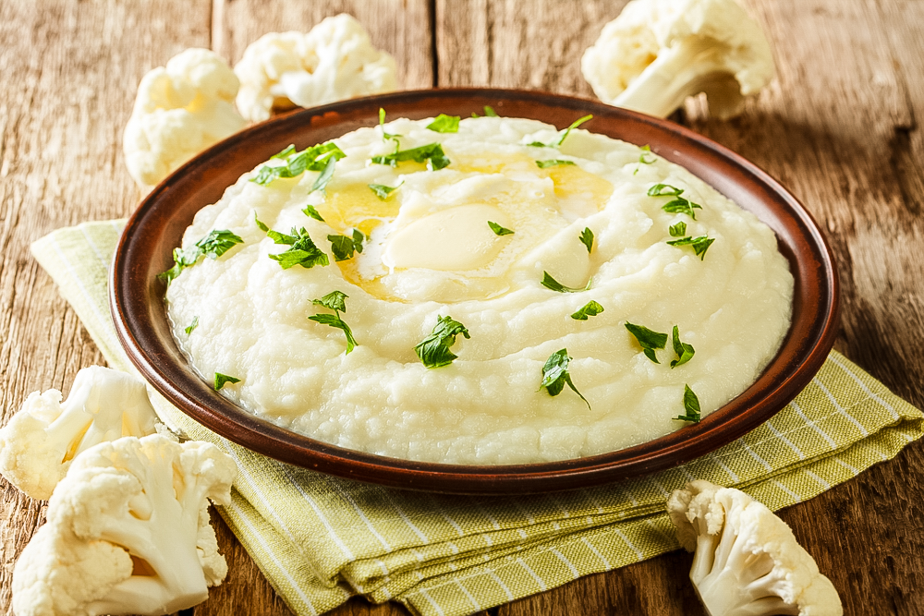bowl of mashed potatoes with butter