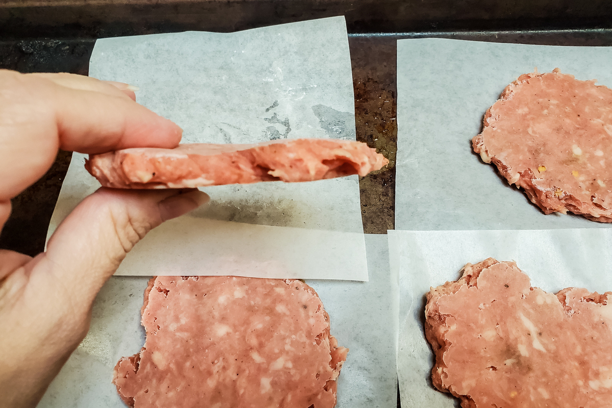 breakfast sausage mixture on waxed paper squares