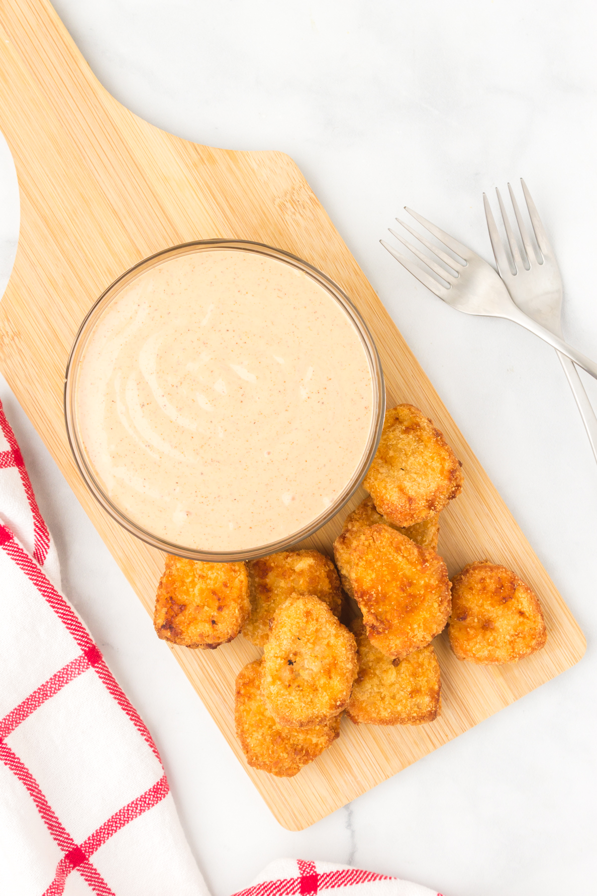 easy to make Mississippi Comeback Sauce in a small bowl being served with chicken nuggets