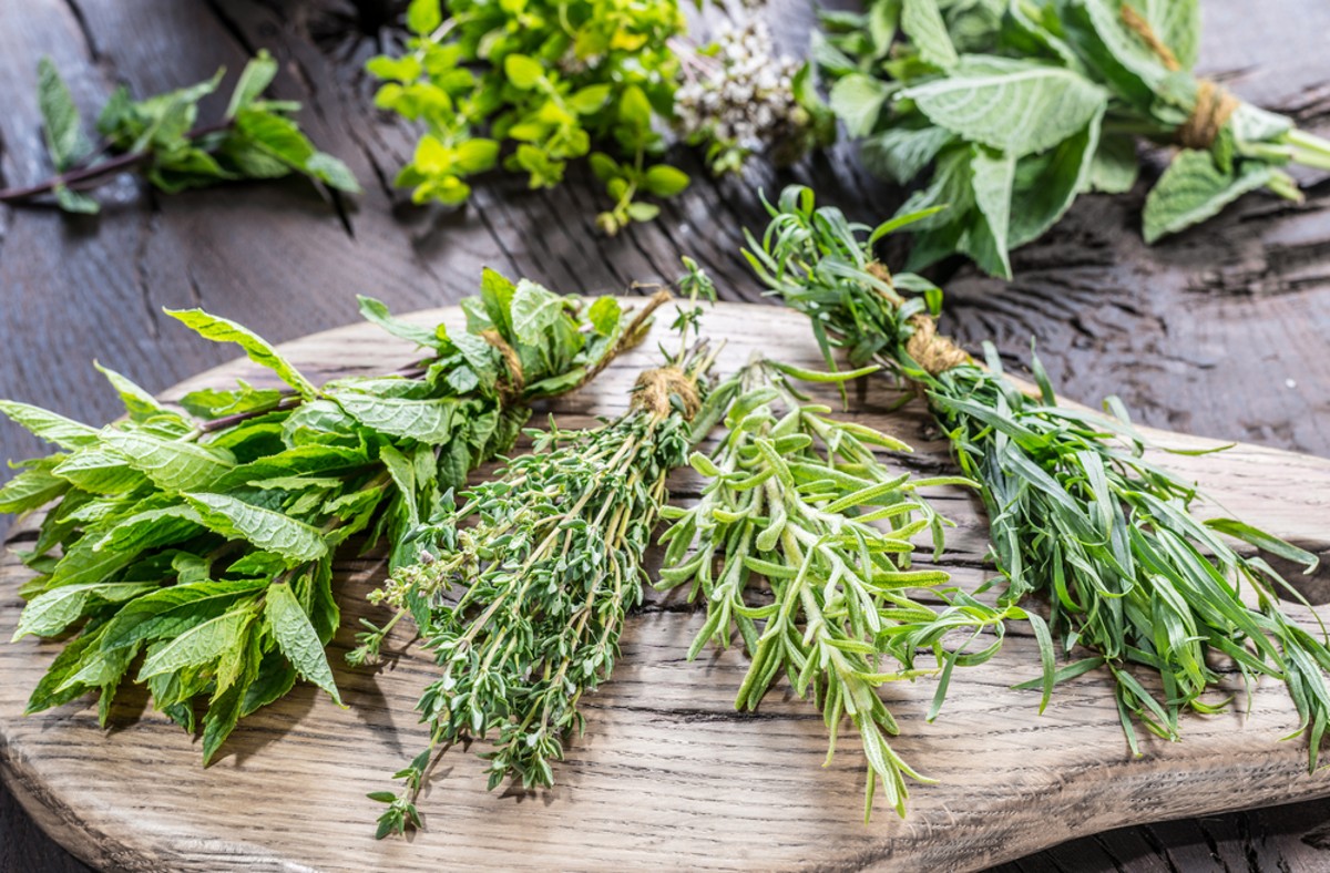 fresh aromatic herbs on a table to use as an Italian seasoning substitute