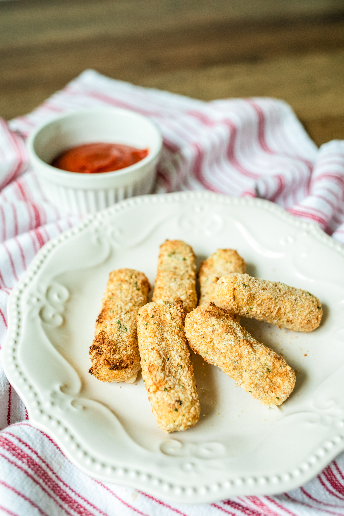 air fryer mozzarella sticks on a plate