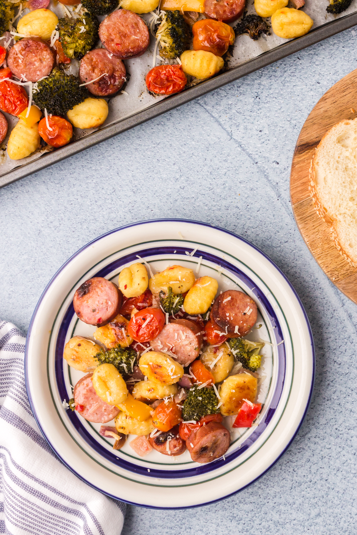 easy sheet pan gnocchi and sausage with diced vegetables on a plate