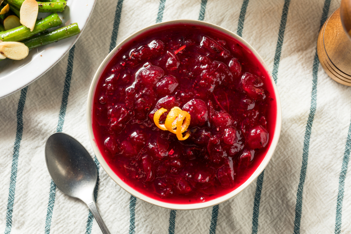 holiday table with a bowl of healthy cranberry sauce