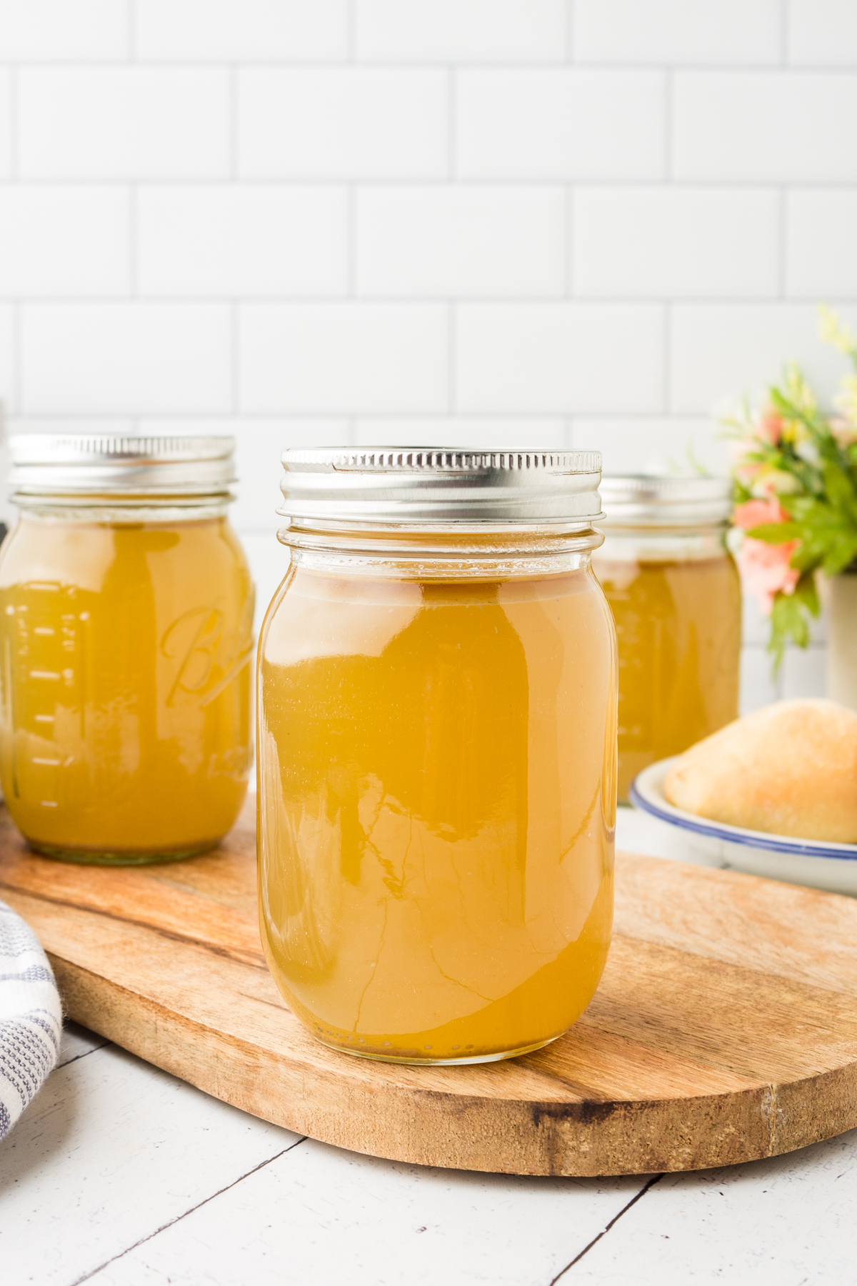 jars filled with turkey bone broth made from a leftover turkey carcass