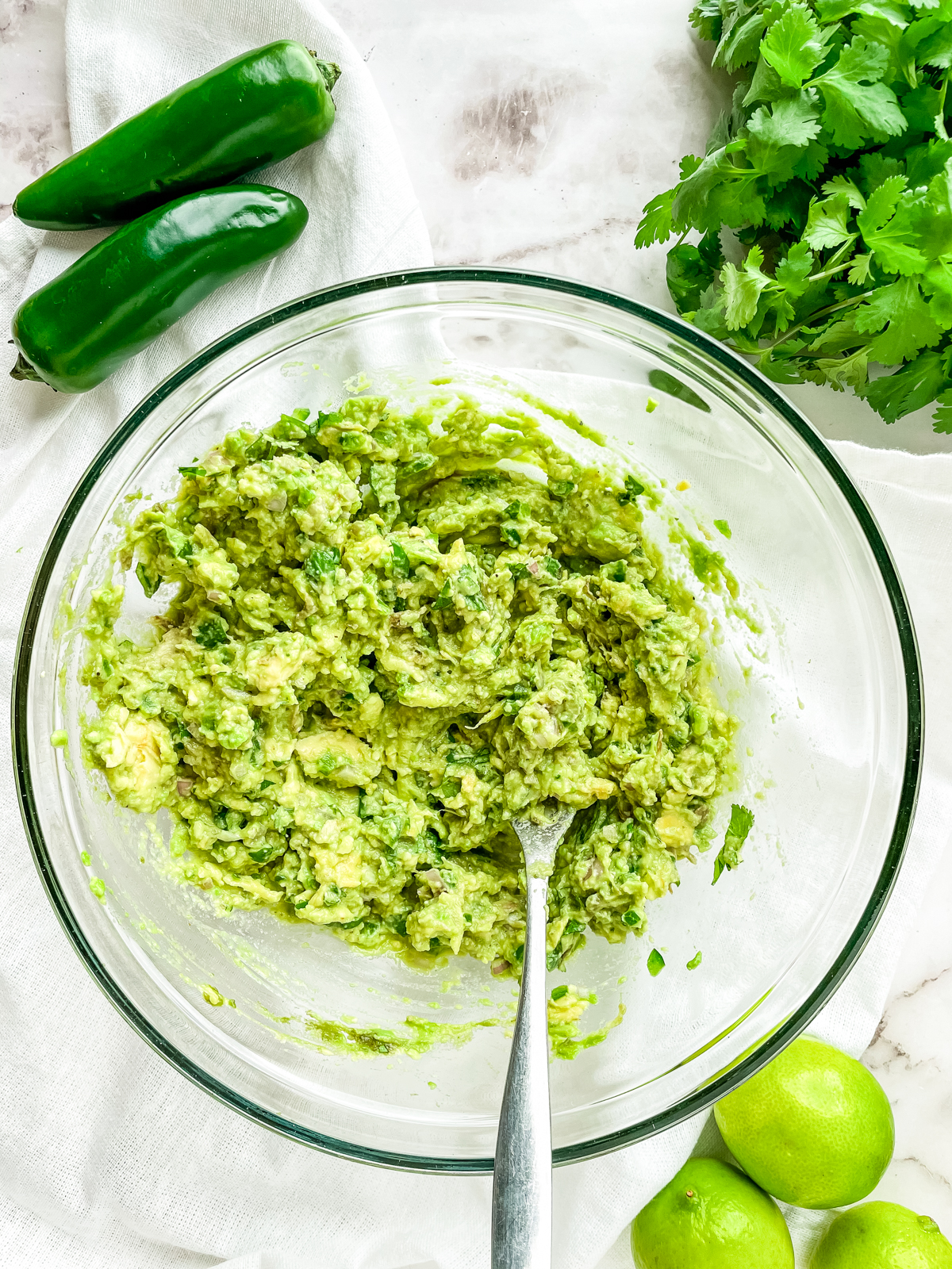 lime juice, cilantro salt and black pepper mixed into mashed avocados