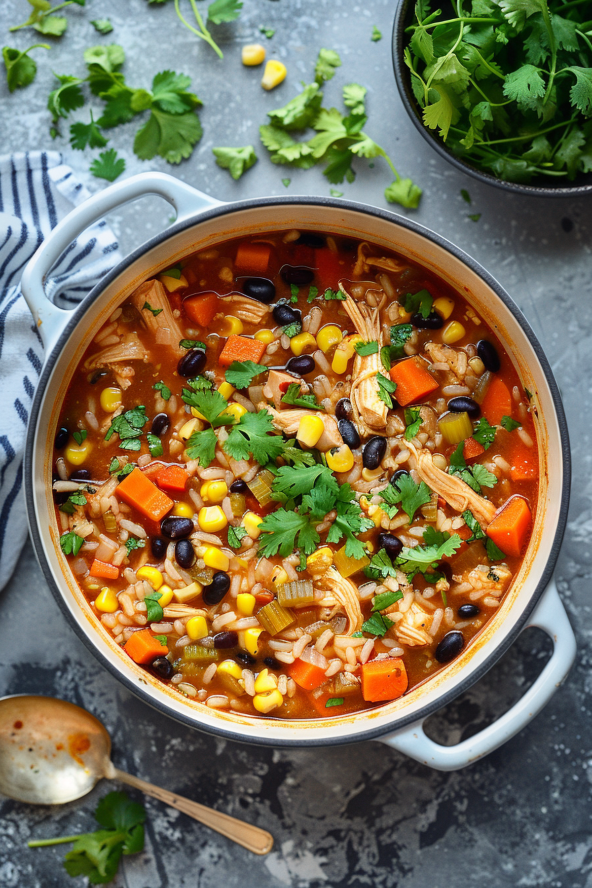 mexican-style chicken soup in a large soup pot