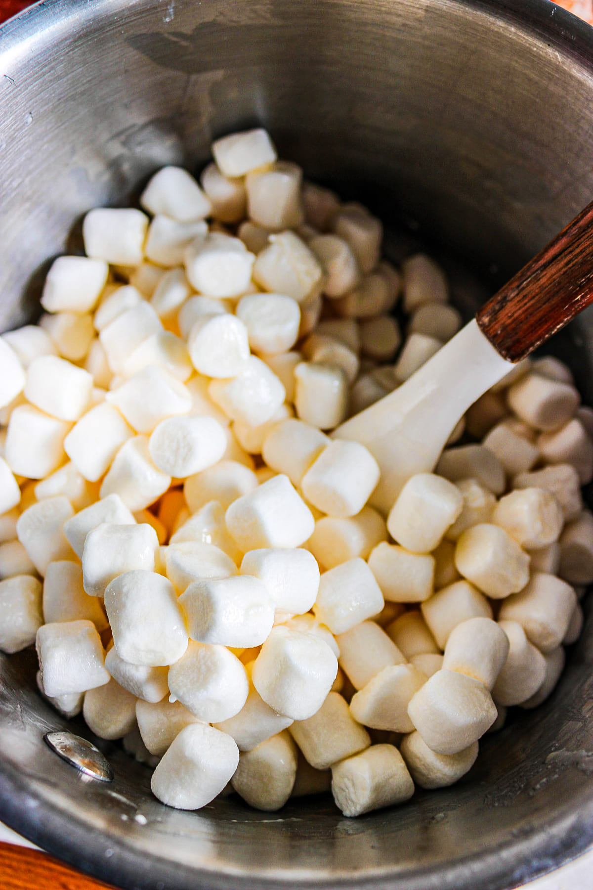 mini marshmallows melting in a large sauce pan