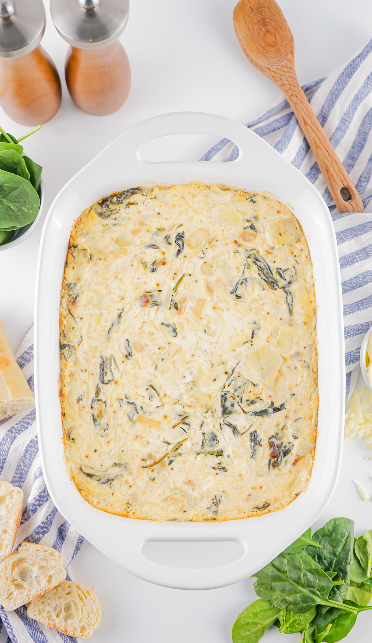 easy spinach artichoke dip in a baking dish