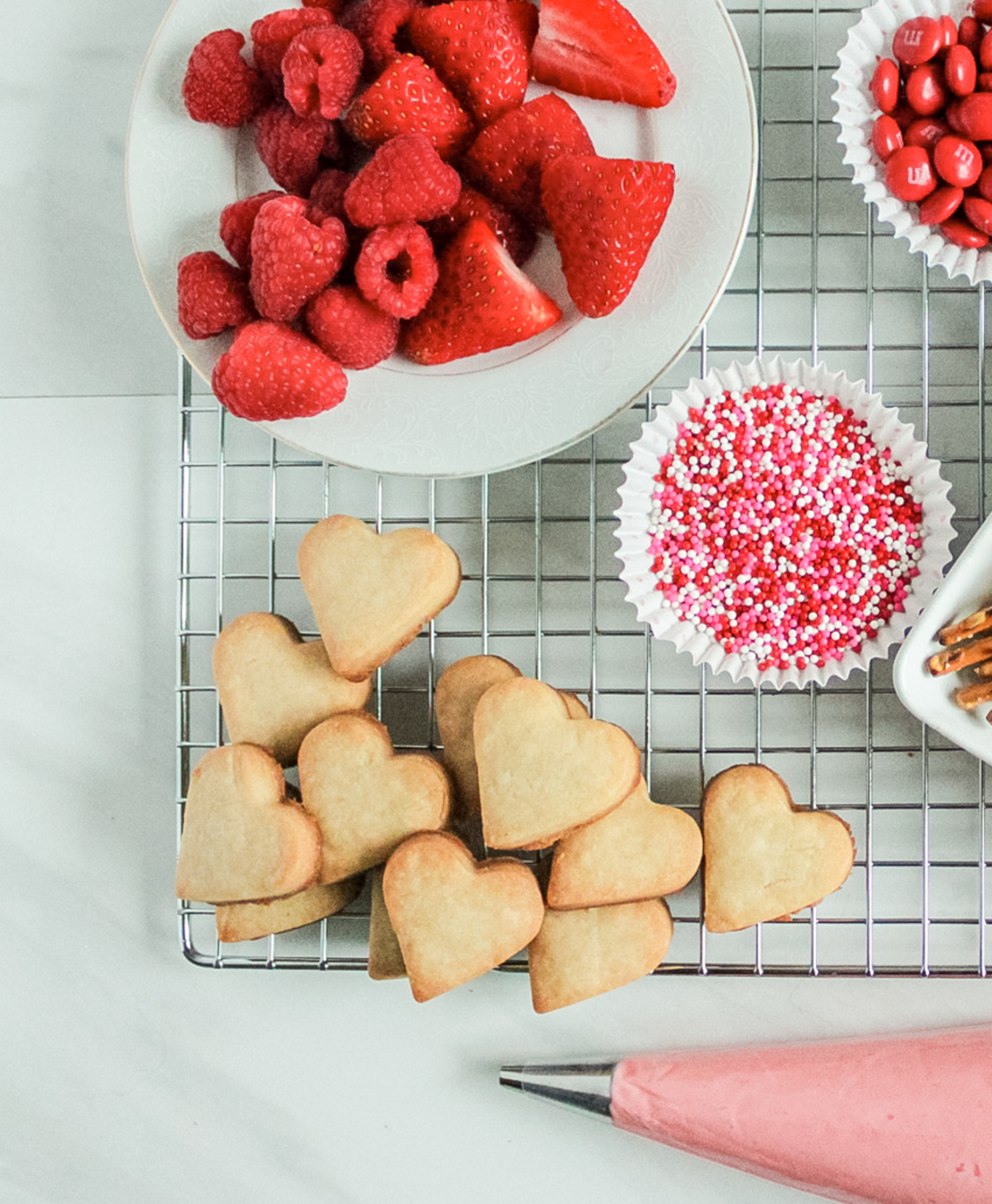 Heart shaped shortbread cookies on a wire rack