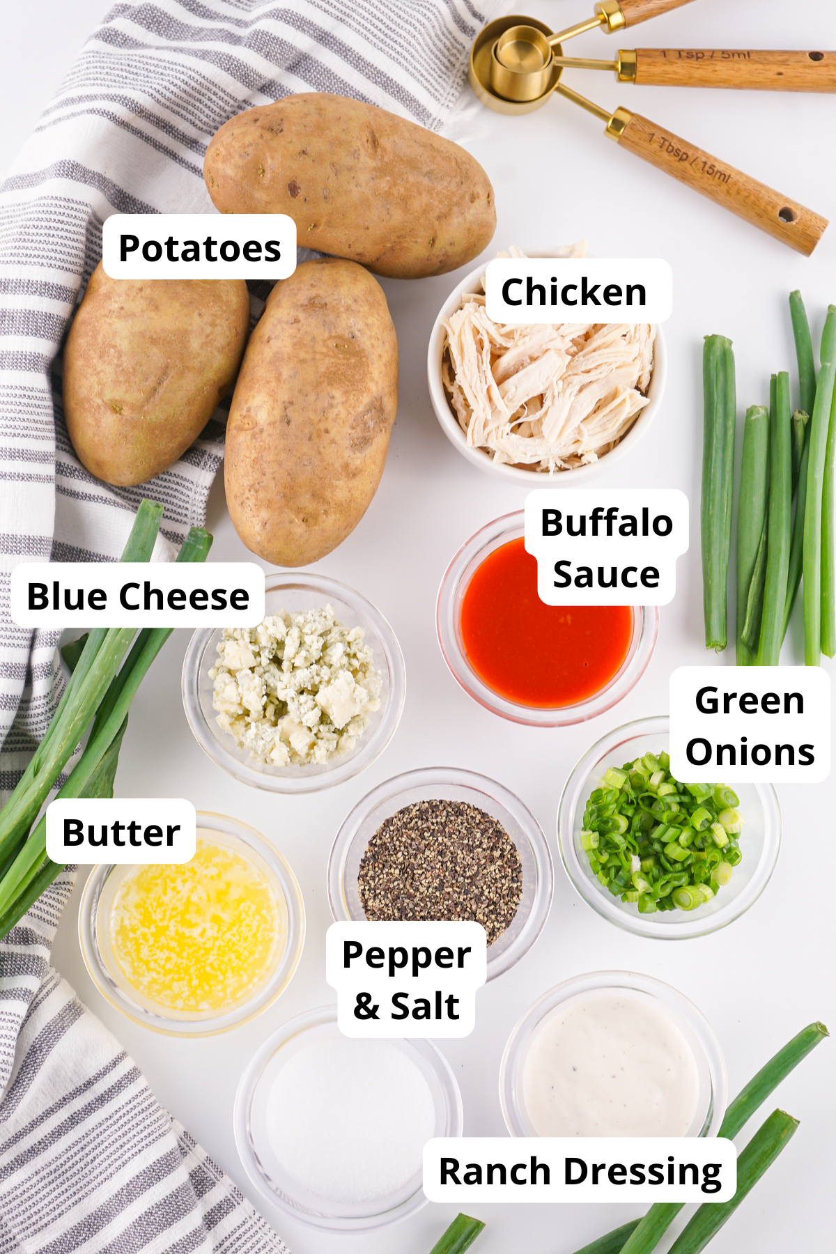 ingredients to make stuffed buffalo chicken baked potatoes