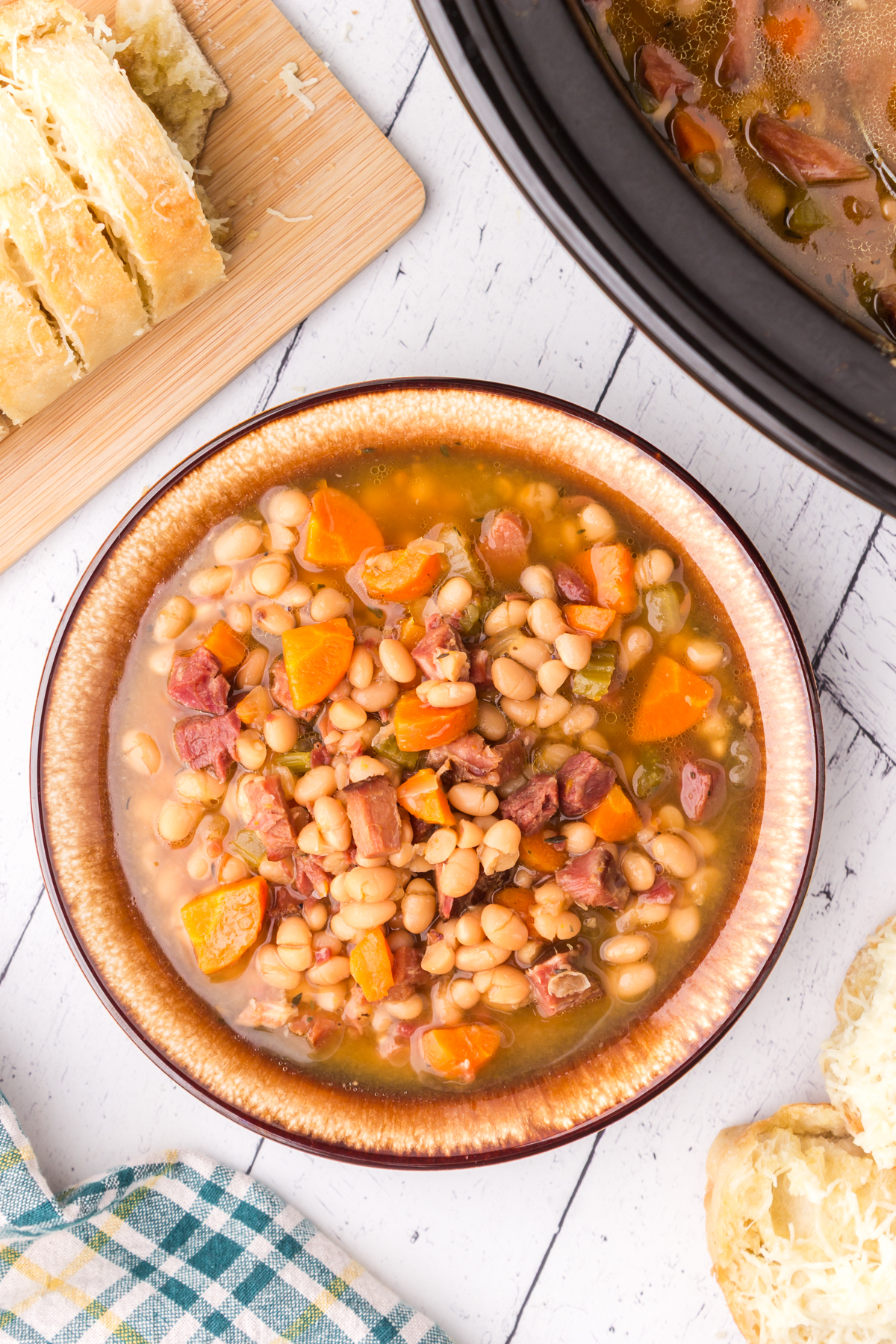 bowl full of slow cooker ham and white bean soup recipe